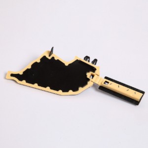 Dubbelfärgad plastdel